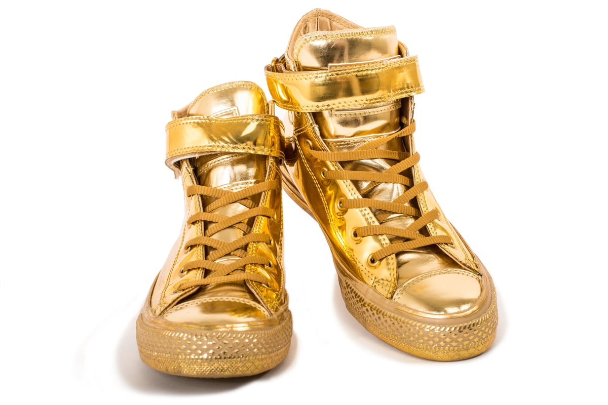 Pair of premium golden designer sneakers
